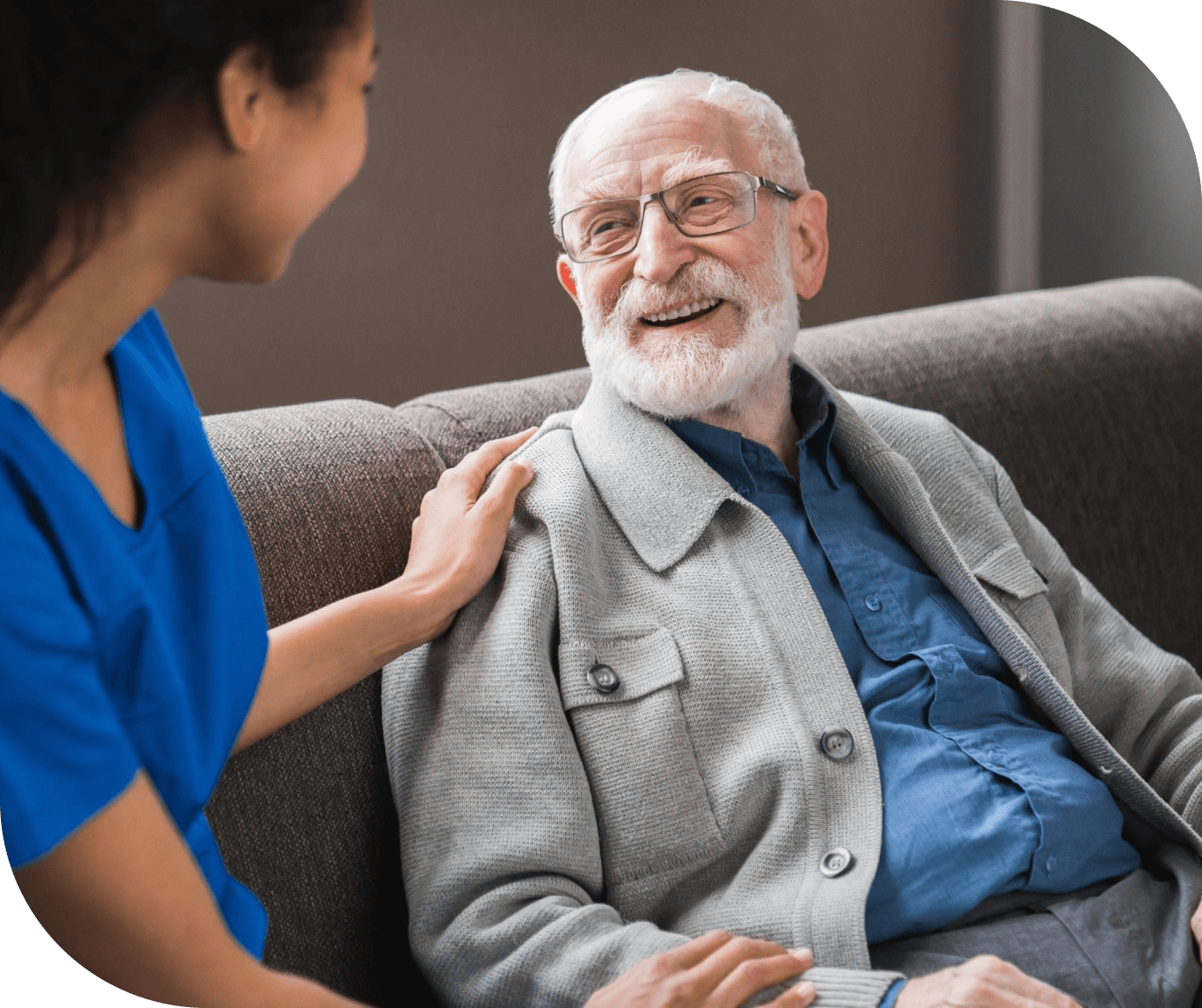 Happy senior man with caregiver.